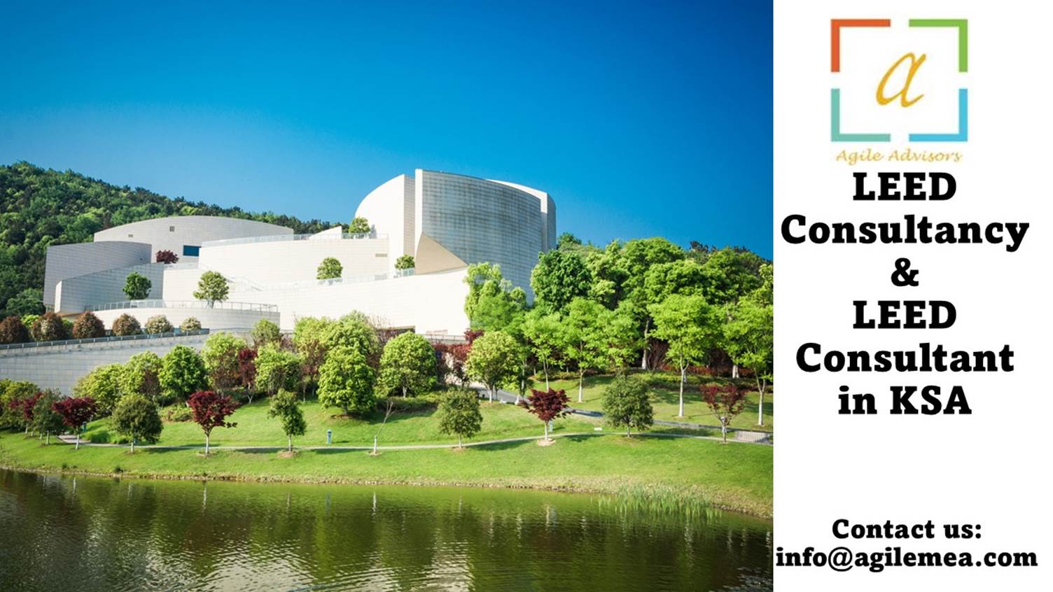 A building with trees and a body of waterAI-generated content may be incorrect.