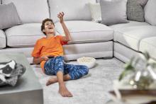 boy on floor after carpet cleaning in long beach ca