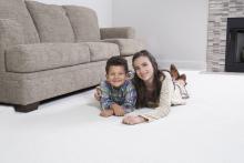 kids on carpet after expert carpet cleaning in Friendswood TX