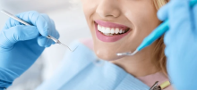 A best dentist in Mississauga performing precise dental work with magnification at Revive Dental, a top clinic.