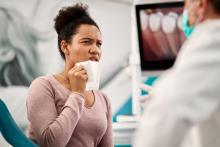 visiting upland dentist for wisdom tooth pain