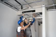 Man fixing a lift