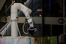 https://www.pexels.com/photo/robotic-arm-in-modern-industrial-setting-35280311/