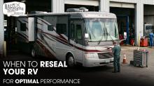 A Class A Motorhome Parked Outside of an RV Repair Shop for Resealing Works
