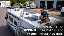 A Technician Repairing a Class A Motorhome's Roof Parked Outside of a workshop