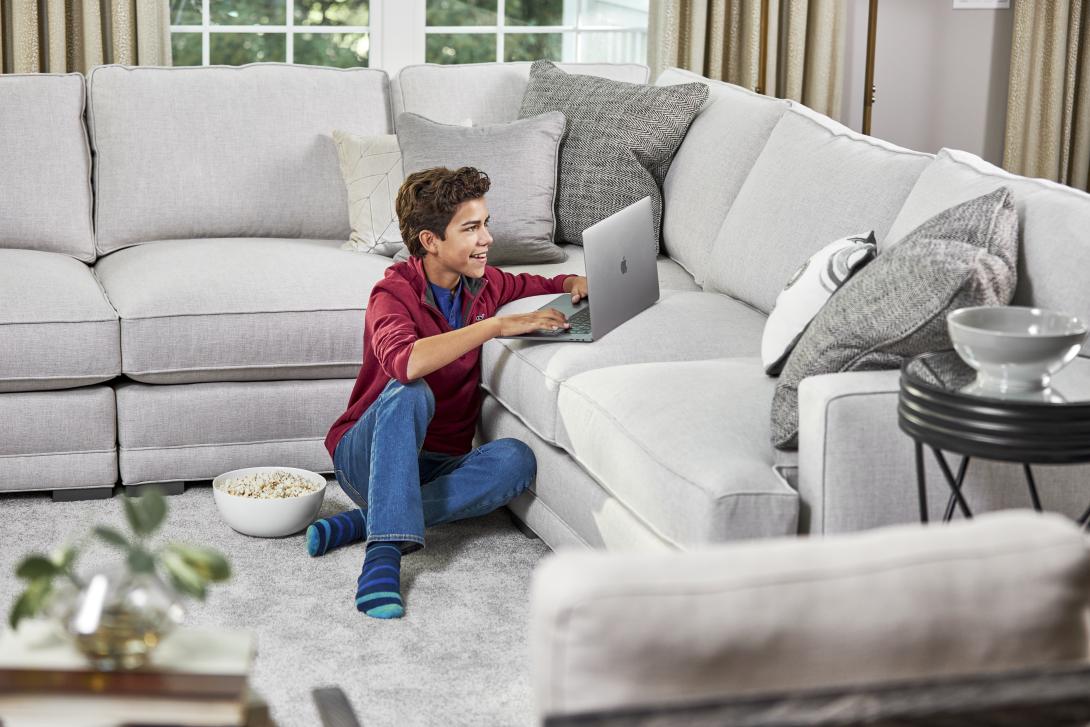 boy in living room after carpet cleaning in signal hill ca