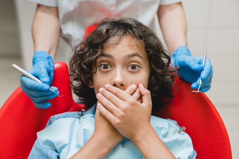 boy-afraid-of-stomatologist-dentist-orthodont