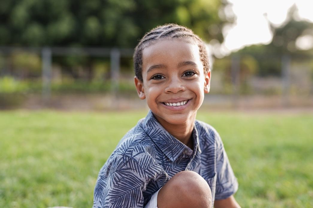 cute-mixed-race-boy-smiling-on-camera-little-mul