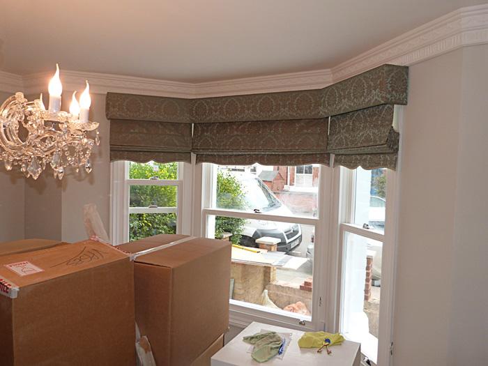Made-to-measure blinds being fitted by experts in London